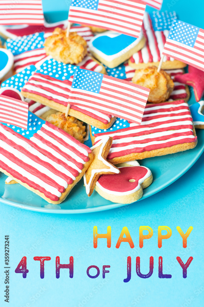 Obraz premium Happy 4th Of July - home baking cookies icing like american flag. patriotic background for US national holidays on blue 