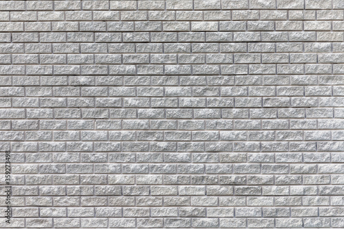 gray brick wall on the street