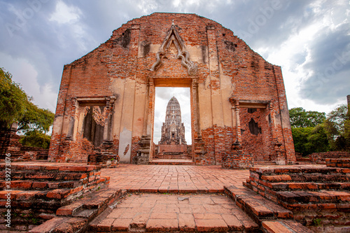 Old paoda Wat Chaiwattanaram the historical temple in Ayutthaya Thailand. photo