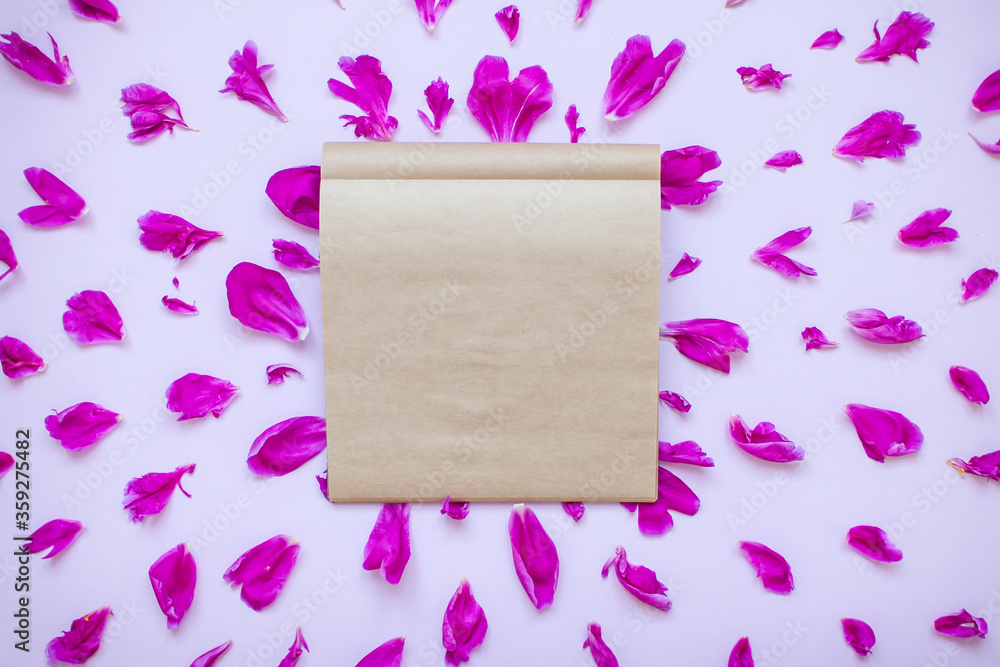 Fuchsia peony layout with blank paper in the center. Flat lay. Fuchsia peony layout with blank paper in the center. Flat lay.