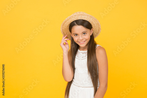Summer tour. Leisure and entertainment concept. Summer happiness. Vacation mood. Tropical tour. Sale and discount. Goods for kids. Adorable little girl wearing elegant hat. Have funny summer holiday