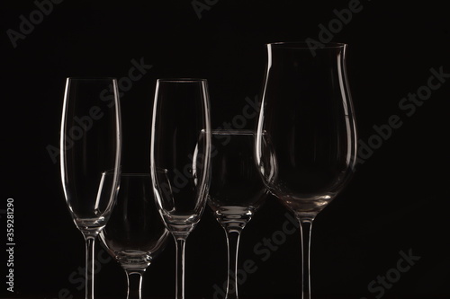 champagne glasses on black background