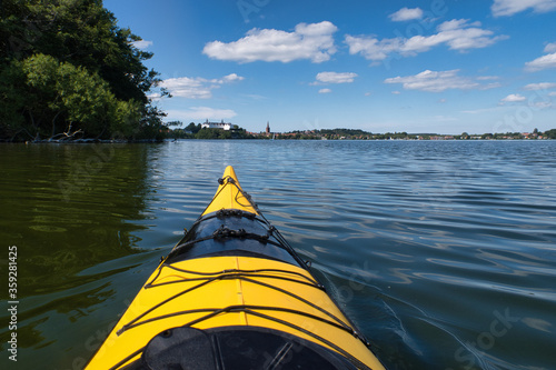 yellow Kayak on ploner plöner ploener See lake in Background Schloss plon Germany