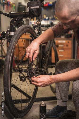 Road bicycle maintenance in service center.