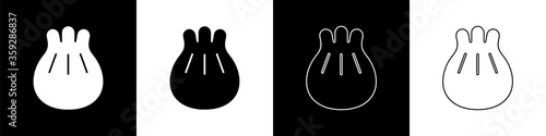 Set Khinkali on cutting board icon isolated on black and white background. Traditional georgian dumpling.  Vector Illustration