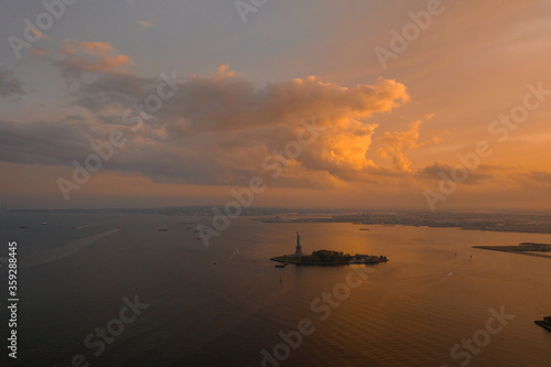 Aerial View of Statue of Liberty at sunset  © raoyang