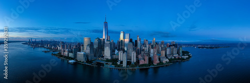 Aerial view of lower Manhattan at dusk from Hudson river. 
