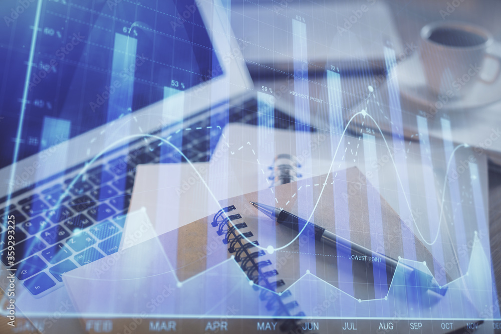 Double exposure of financial chart drawing and desktop with coffee and items on table background. Concept of forex market trading Double exposure of financial chart drawing and desktop with coffee and items on table background. Concept of forex market trading