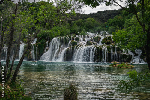 Beautiful Krka waterfalls with a lush green trees and turquoise water. Croatia, 28th April 2015. 