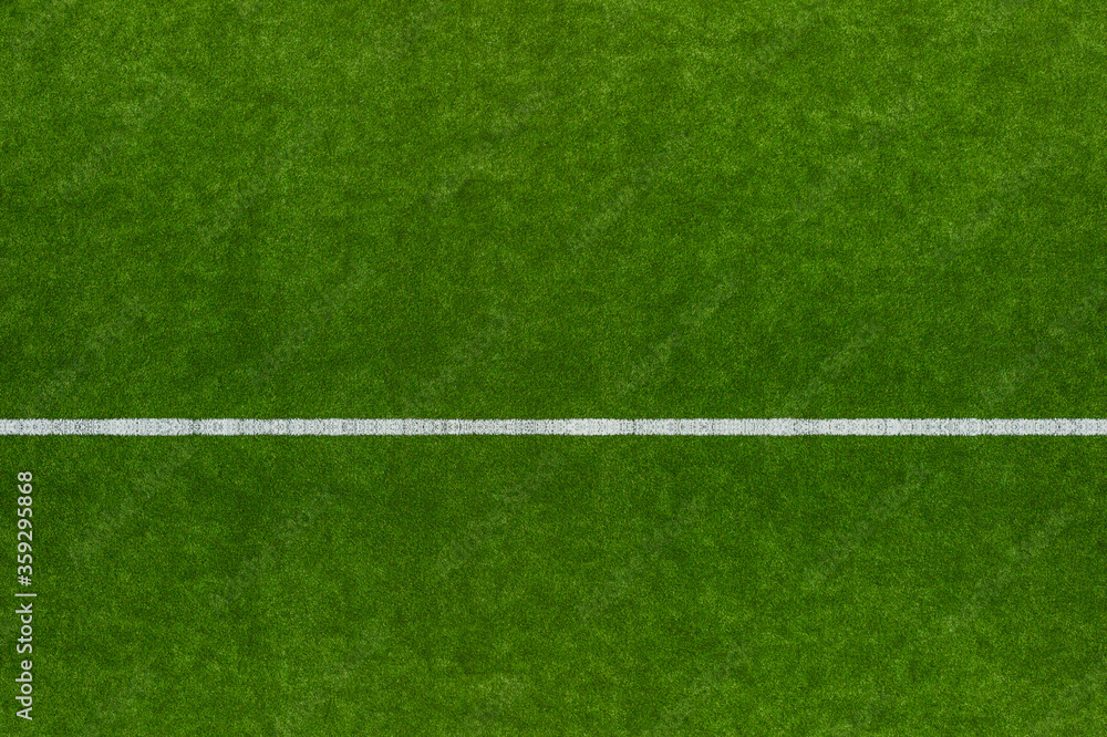 Obraz premium Green Synthetic Grass Sports Field With White Line Shot From Above. Sports Or Leisure Concept