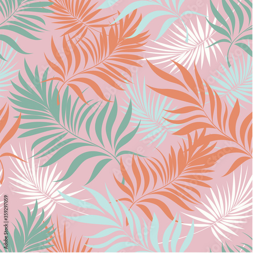 Palm leaves. Tropical seamless background pattern. Graphic design with amazing palm trees suitable for fabrics, packaging, covers