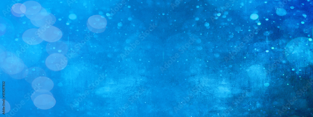 Abstract festive celebration template texture background banner panorama - Blue bokeh lights isolated on blue paper texture, with space for text Abstract festive celebration template texture background banner panorama - Blue bokeh lights isolated on blue paper texture, with space for text