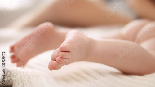 Close up shot of little baby feet. Selective soft focus. High quality 4k footage