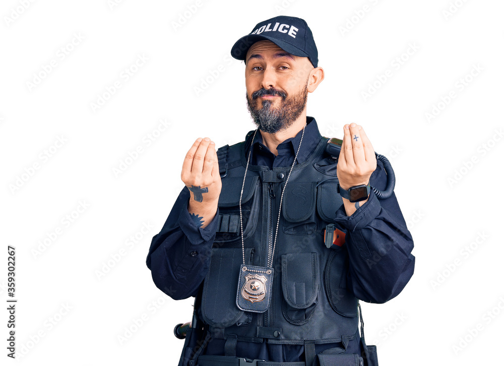 Young handsome man wearing police uniform doing money gesture with hands, asking for salary payment, millionaire business Young handsome man wearing police uniform doing money gesture with hands, asking for salary payment, millionaire business