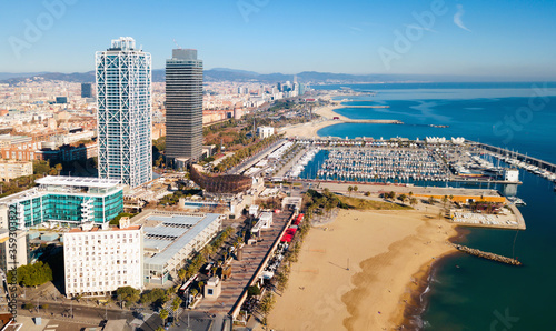 Aerial view of Barcelona with skyscrapers on coast © JackF