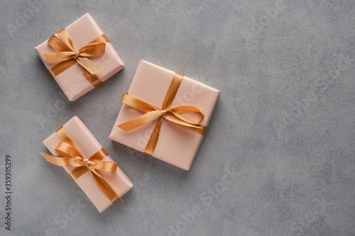 Gift boxes with golden ribbon