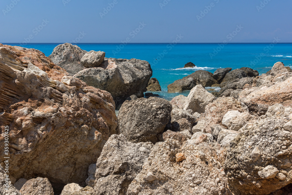 blue waters and rocks of Megali Petra Beach, Lefkada, Greece blue waters and rocks of Megali Petra Beach, Lefkada, Greece