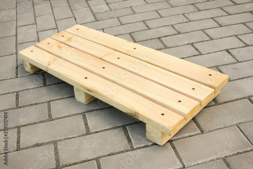 Plank floor grille on a stone floor