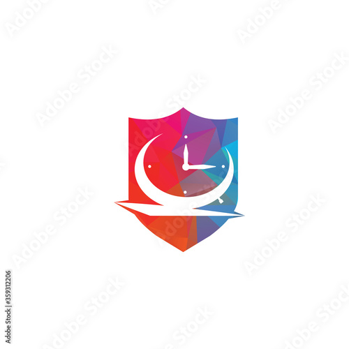 Time clock in shield shape logo design template. Table alarm clock vector design.