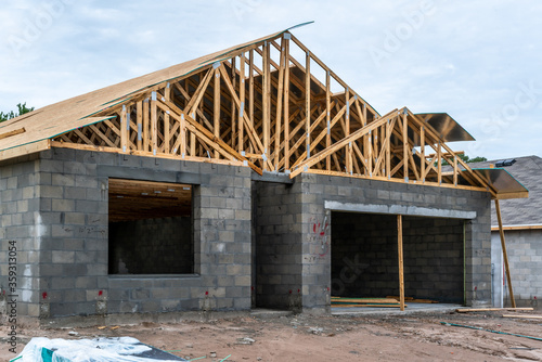 New home construction in west-central Florida from foundations, blockwork, framing, electrical, plumbing, HVAC, and setting trusses.