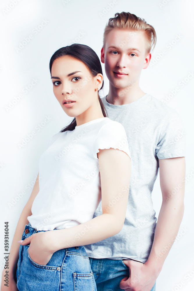 modern hipster guys together couple diverse nations, asian girl and caucasian blond boy isolated on white background, lifestyle people concept modern hipster guys together couple diverse nations, asian girl and caucasian blond boy isolated on white background, lifestyle people concept