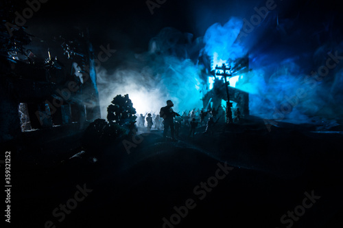 War Concept. Military silhouettes fighting scene on war fog sky background  World War Soldiers Silhouette Below Cloudy Skyline At night.
