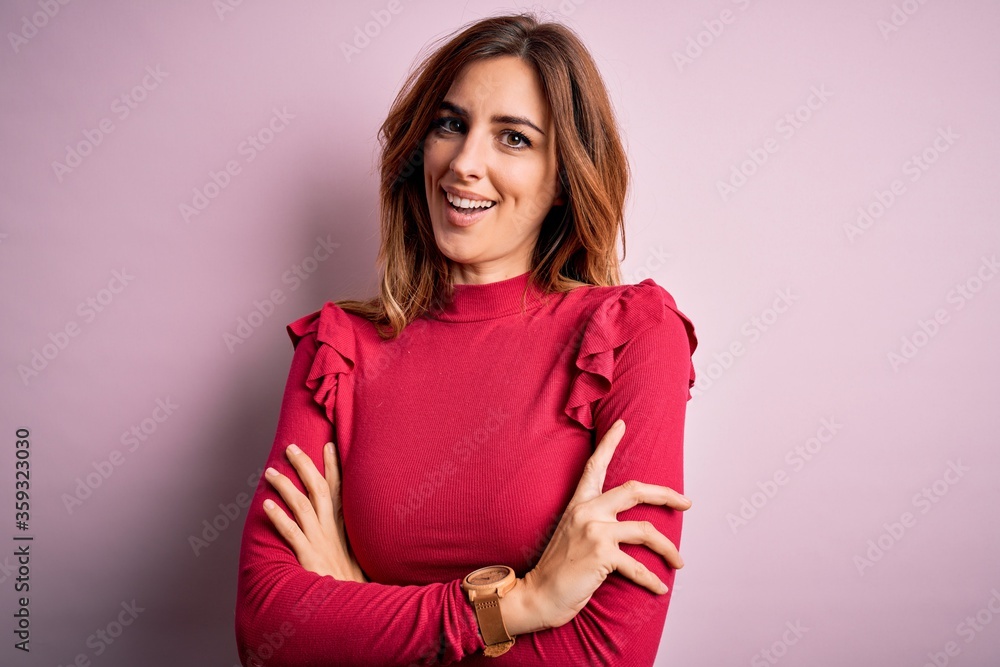 Young beautiful brunette woman wearing casual sweater stnding over pink background happy face smiling with crossed arms looking at the camera. Positive person. Young beautiful brunette woman wearing casual sweater stnding over pink background happy face smiling with crossed arms looking at the camera. Positive person.