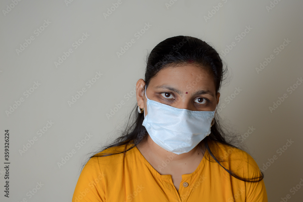 asian lady wearing medical mask for protection from viruses and bacterias durind covid 19 pandemic asian lady wearing medical mask for protection from viruses and bacterias durind covid 19 pandemic