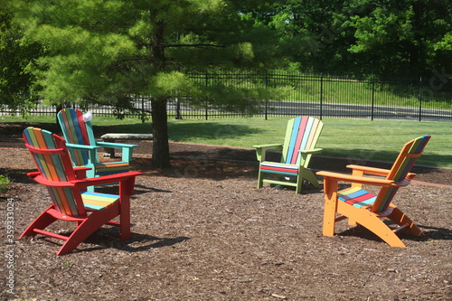 SOCIAL DISTANCING WITH COLORED LAWN CHAIRS