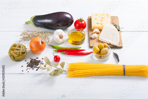 mediterranean food ingredients on white wood table