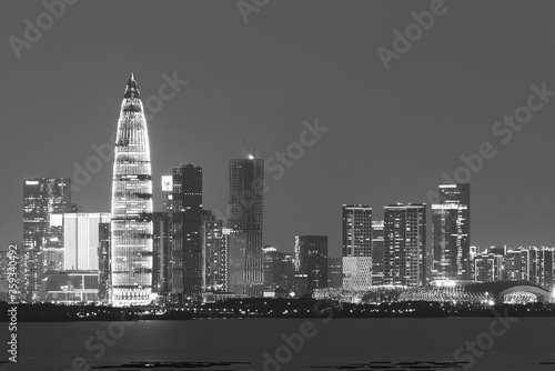 Skyline of Shenzhen city, China at night. Viewed from Hong Kong border © leeyiutung