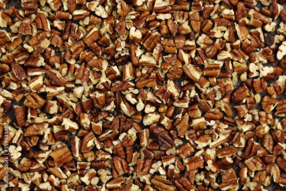 Texture of crushed pecan nuts. Directly Above. Texture of crushed pecan nuts. Directly Above.
