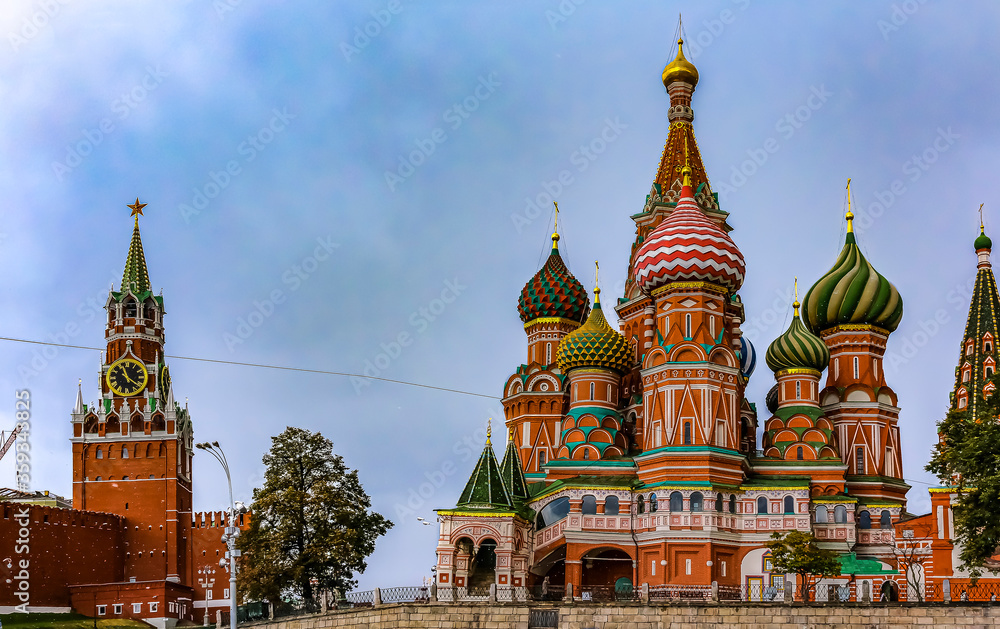 Daytime view of the Kremlin and the Saint Basil's Cathedral on Red Square in Moscow, Russia, main square of the country Daytime view of the Kremlin and the Saint Basil's Cathedral on Red Square in Moscow, Russia, main square of the country