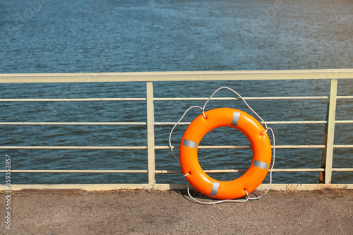 Lifebuoy ring on berth outdoors photo