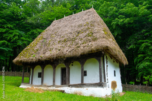clay house with thatched roof
