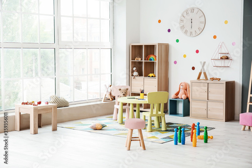 Tableau sur toile Stylish interior of modern playroom in kindergarten