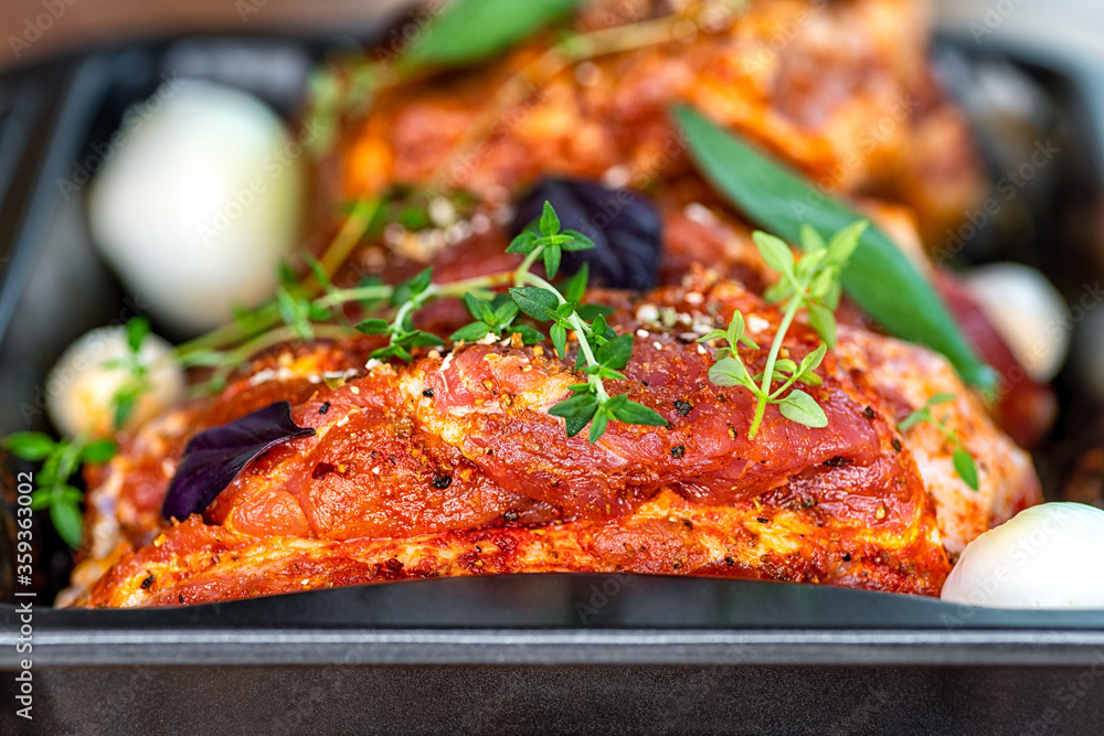Fototapeta premium Raw pork on a baking tray