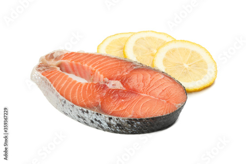 Fresh raw salmon meat and lemon isolated on white background