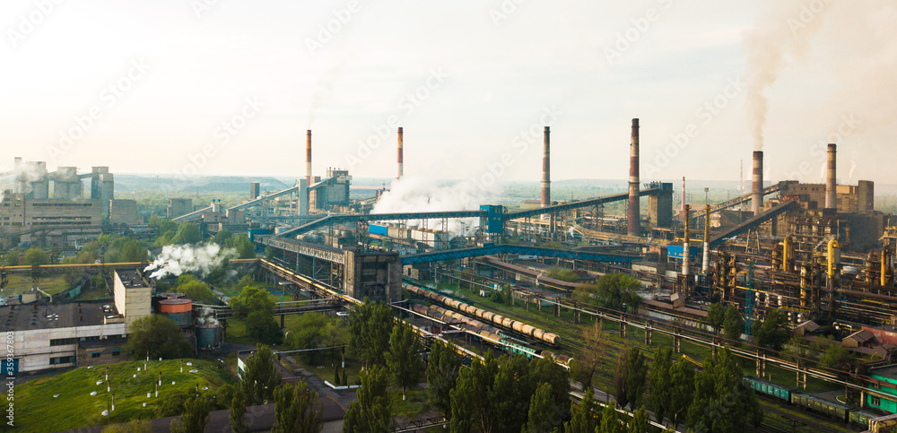 Industry metallurgical plant smoke from pipes mining ecology pollution.