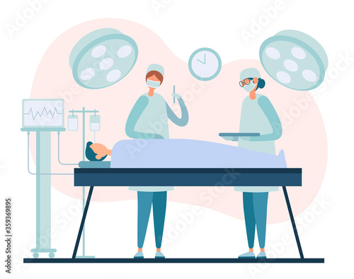Surgical team performing operation on patient in hospital