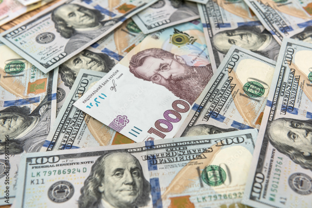 Ukrainian hryvnia and dollar exchange close-up top view Ukrainian hryvnia and dollar exchange close-up top view