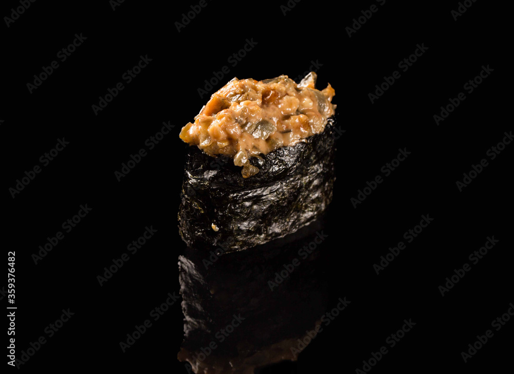 sushi SALMON SPICE on black background.Traditional Asian dish on a black background sushi SALMON SPICE on black background.Traditional Asian dish on a black background