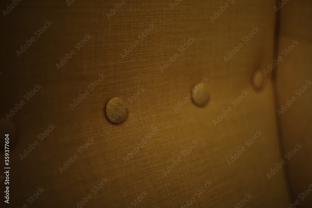 Buttons on armchairs and sofas, the use of buttons in decorating objects Buttons on armchairs and sofas, the use of buttons in decorating objects