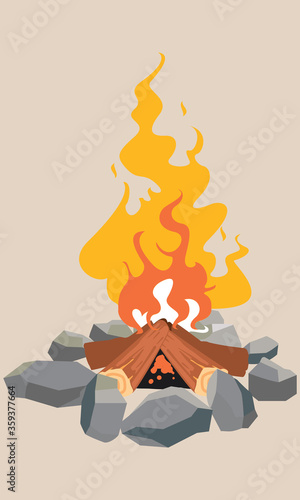 Small campfire with gentle flames. Camping activities concept. Wood campfire. Outdoor bonfire, fire burning wooden logs and camping stone fireplace. Firewood flames, burn campfire or bonfire flame fir