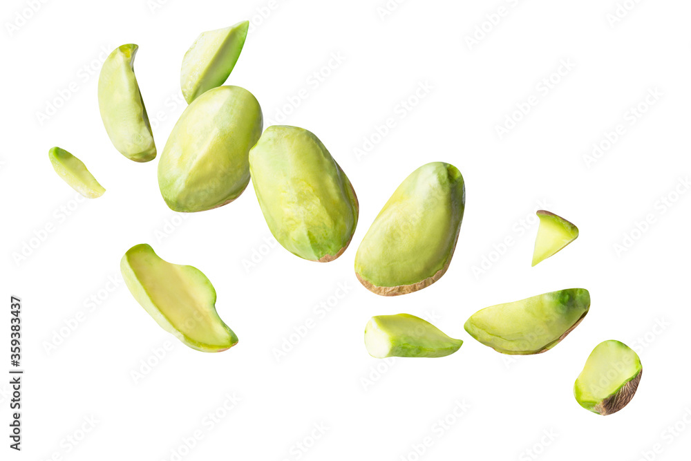 full pistachio piece floating in the air isolated on white background clipping path, full depth of field full pistachio piece floating in the air isolated on white background clipping path, full depth of field