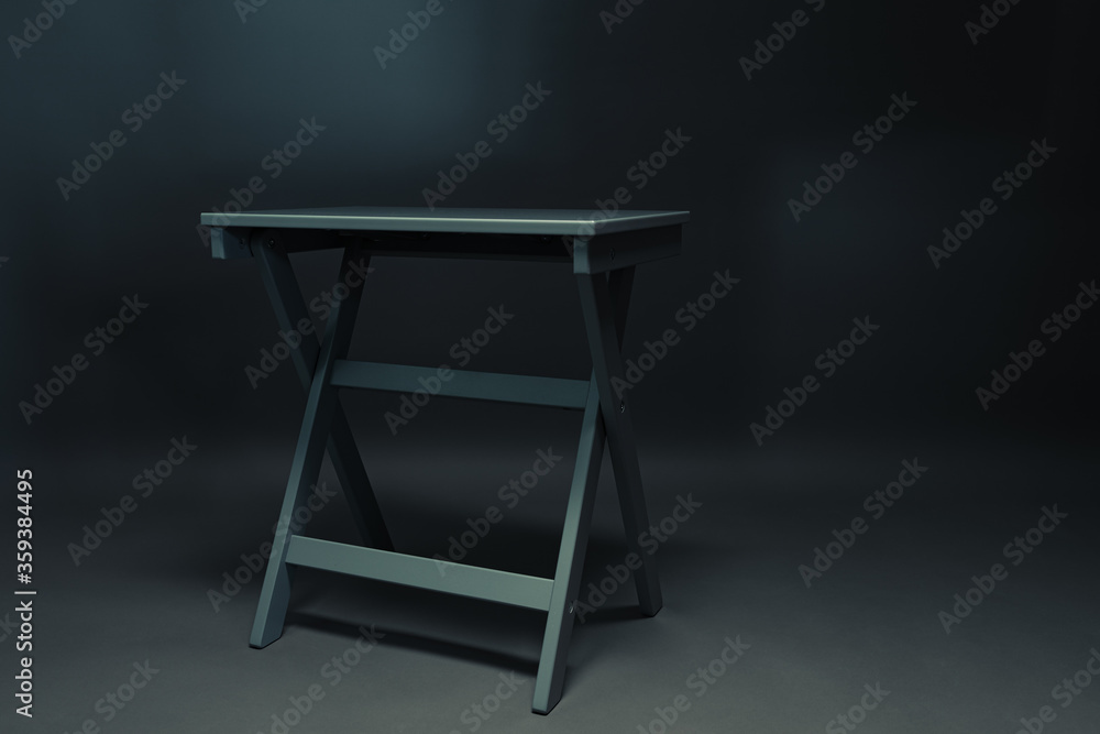 Grey folding table on the grey background. Grey folding table on the grey background.