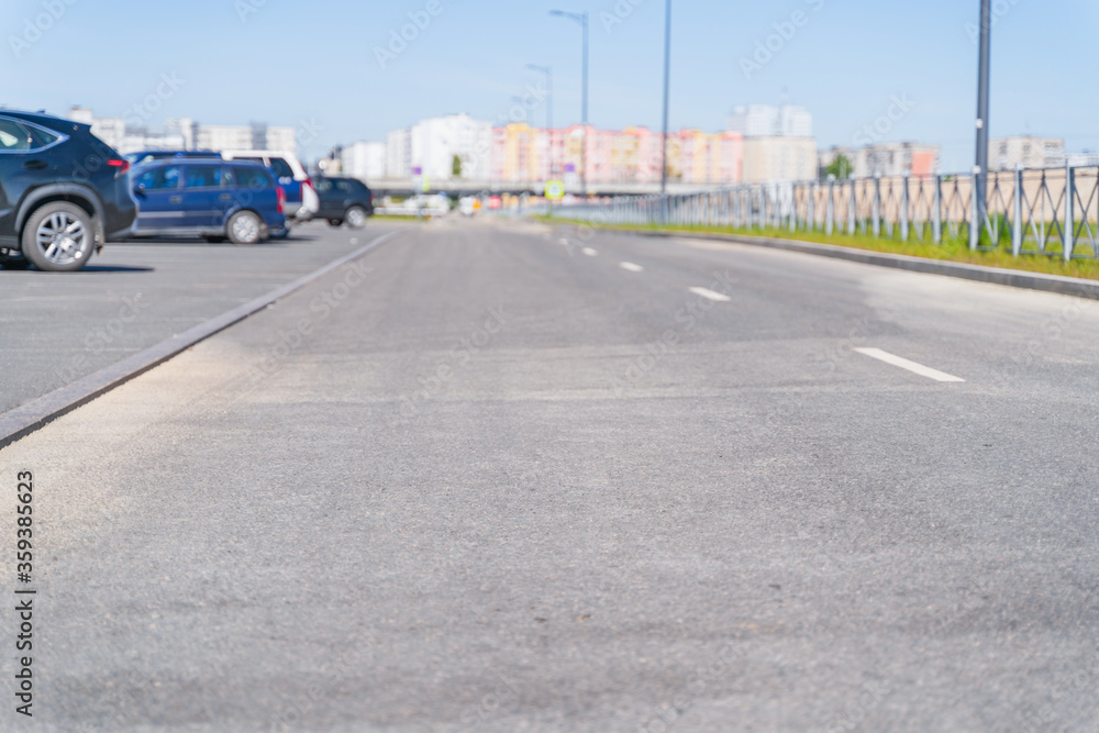 Sity  road  and road markings, focus to the foreground, blurred background