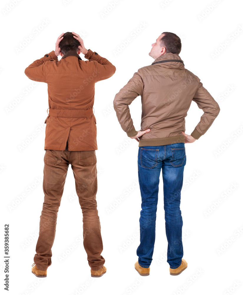 Back view of couple in winter jacket. Back view of couple in winter jacket.