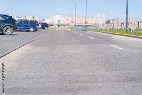 Sity road and road markings, focus to the foreground, blurred background