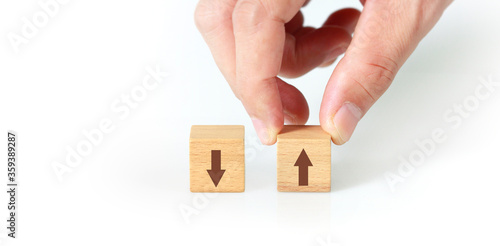 Concept creative idea innovation. wooden cube block in hand with symbol